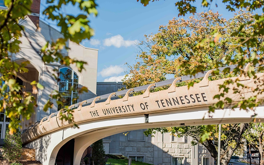 walkway bridge that reads the university of tennessee